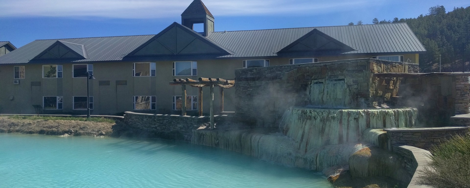 While this is not a photo of pools on the upper terrace (I was too scared to bring my phone along), this huge pool sits behind the resort.