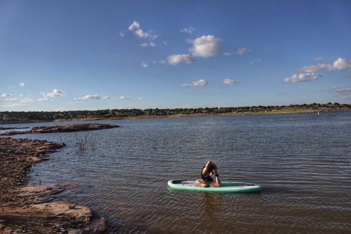 Mermaid pose on the paddleboard.