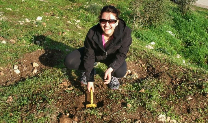 Planting a tree in Israel.