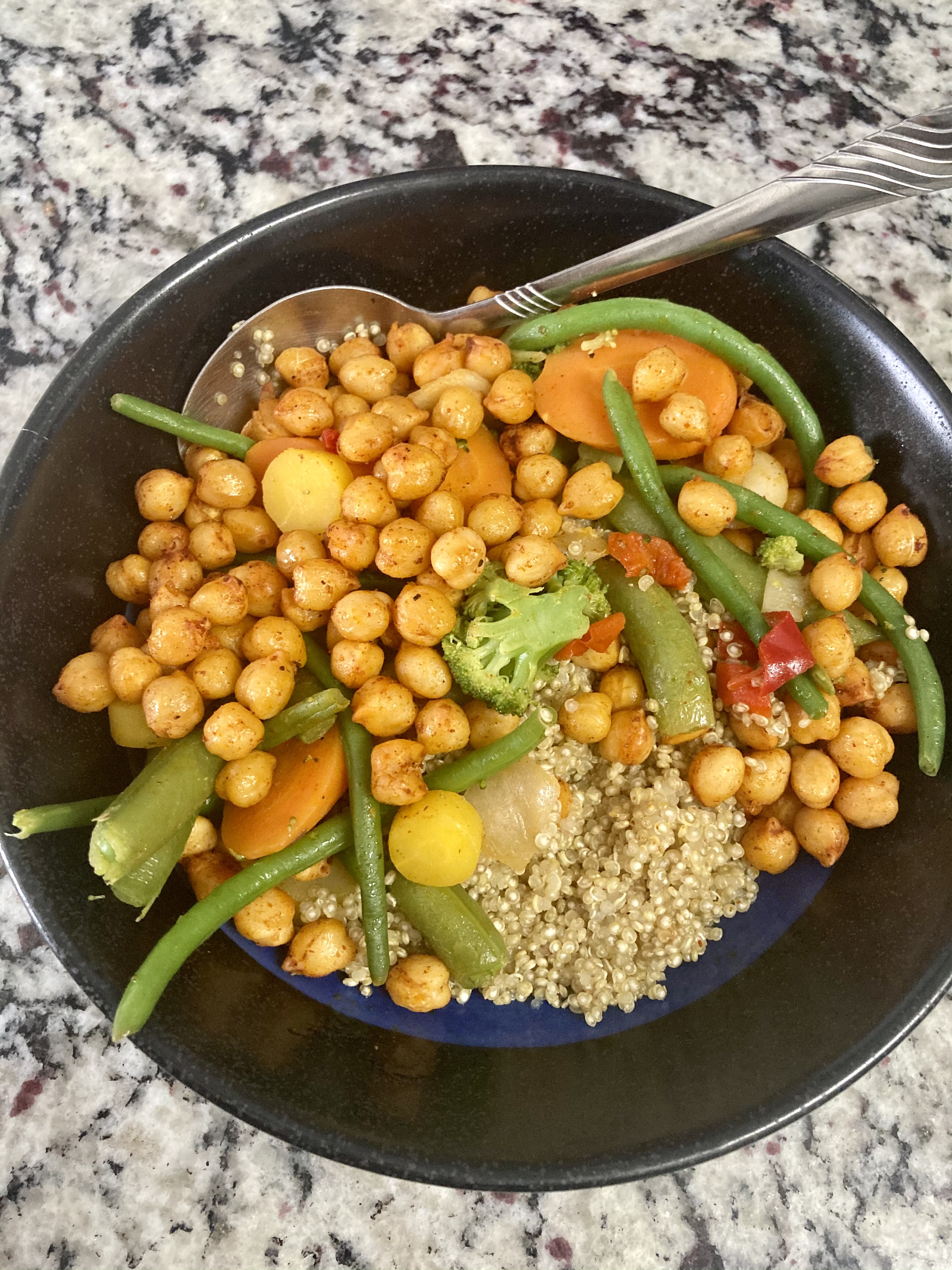 quinoa bowl with roasted chickpeas and veggies.